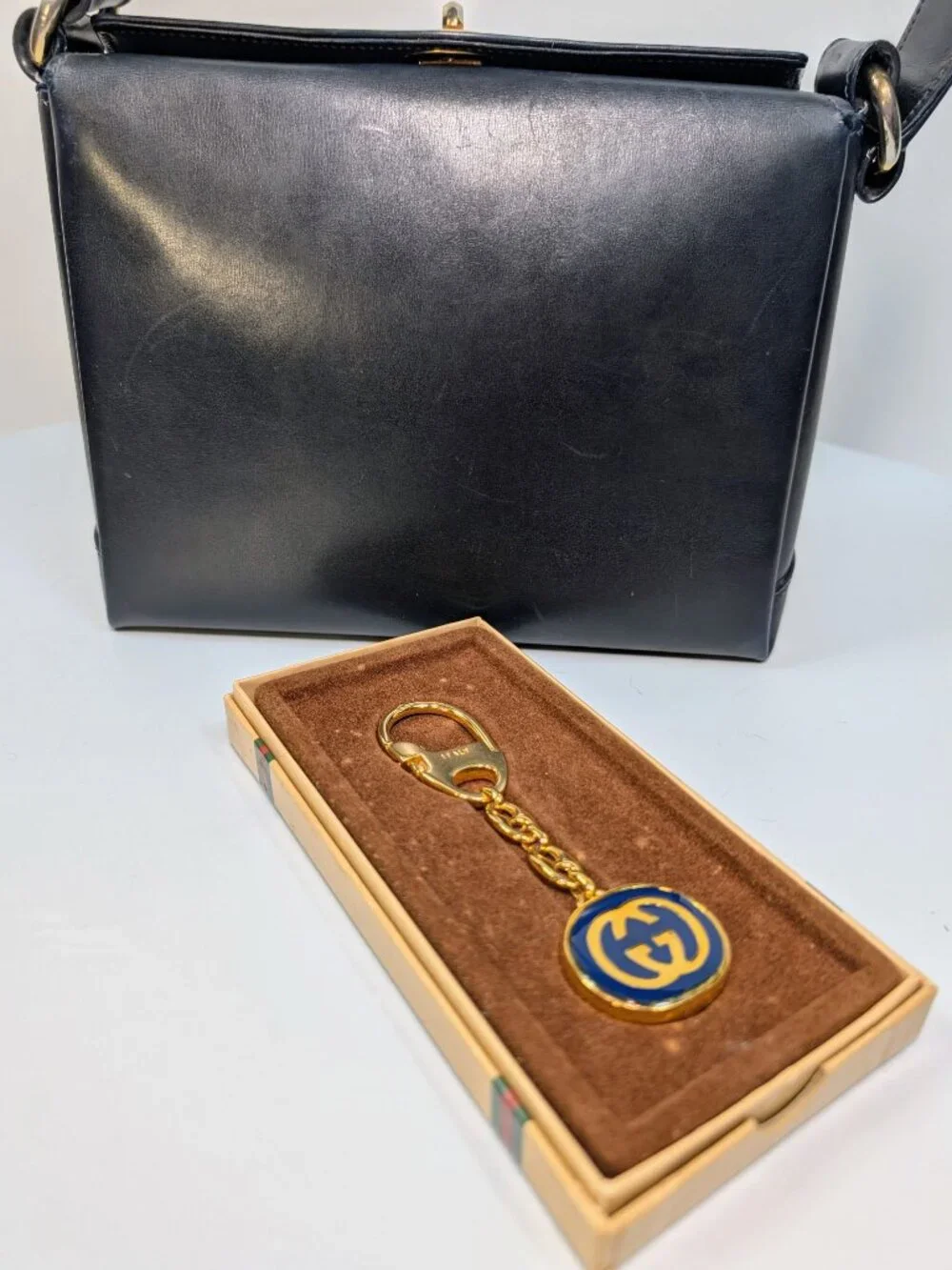 Gucci Vintage Gold Tone GG Logo Embossed Circle Bag Charm